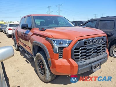 Czwarte zdjęcie samochodu z boku: 2024 TOYOTA TUNDRA TRD PRO HV VIN:5TFPC5DB1RX057357 - miniatura