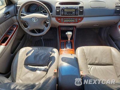 Zdjęcie 8 z 12 samochodu: 2002 TOYOTA CAMRY XLE V6 VIN:4T1BF32K52U024521 - miniatura
