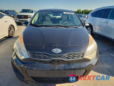 Piąte zdjęcie samochodu w środku: 2012 KIA RIO LX VIN:KNADM5A39C6039342 - miniatura