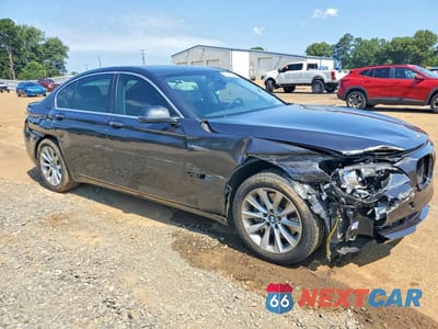 Czwarte zdjęcie samochodu z boku: 2015 BMW 740 I VIN:WBAYA6C59FGK16582 - miniatura