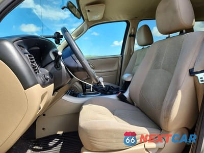 Zdjęcie 7 z 13 samochodu: 2005 MAZDA TRIBUTE VIN:4F2CZ94155KM49325 - miniatura