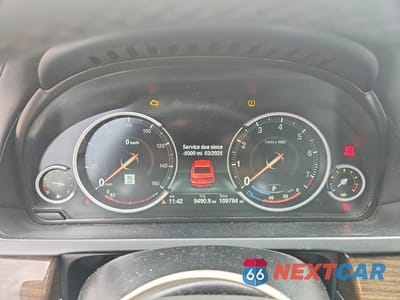 Zdjęcie 9 z 13 samochodu: 2014 BMW 750 LXI VIN:WBAYF8C56ED141806 - miniatura