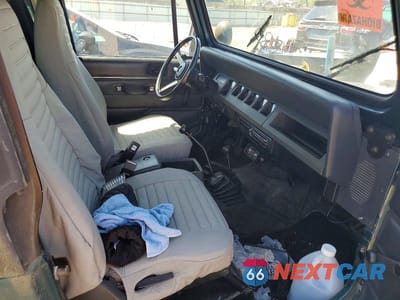 Zdjęcie 7 z 12 samochodu: 1995 JEEP WRANGLER VIN:1J4FY19P5SP266062 - miniatura