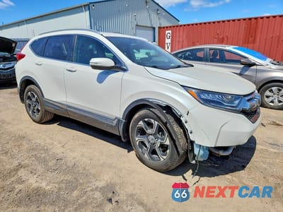 Czwarte zdjęcie samochodu z boku: 2017 HONDA CR-V TOURING VIN:2HKRW2H99HH131527 - miniatura