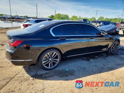 Trzecie zdjęcie samochodu z tyłu: 2020 BMW 750 XI VIN:WBA7U2C08LCD32877 - miniatura