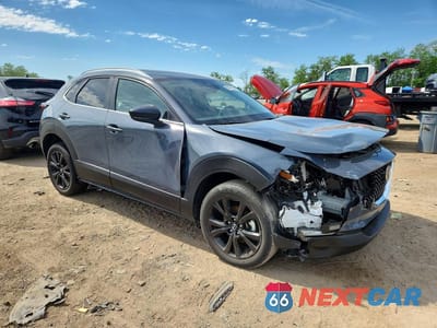 Czwarte zdjęcie samochodu z boku: 2025 MAZDA CX-30 AWD S CARBON EDITION VIN:3MVDMBCM7SM812443 - miniatura