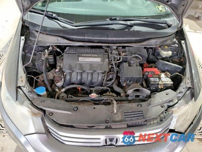 Zdjęcie 11 z 12 samochodu: 2010 HONDA INSIGHT EX VIN:JHMZE2H78AS004520 - miniatura