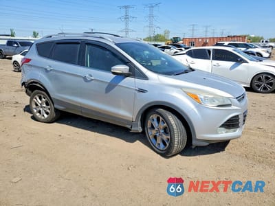 Czwarte zdjęcie samochodu z boku: 2014 FORD ESCAPE TITANIUM VIN:1FMCU0JX2EUA50892 - miniatura
