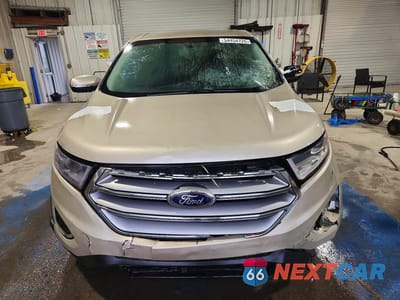 Piąte zdjęcie samochodu w środku: 2017 FORD EDGE TITANIUM VIN:2FMPK4K84HBC70017 - miniatura