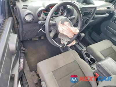 Zdjęcie 8 z 13 samochodu: 2010 JEEP WRANGLER SPORT VIN:1J4AA2D14AL102475 - miniatura