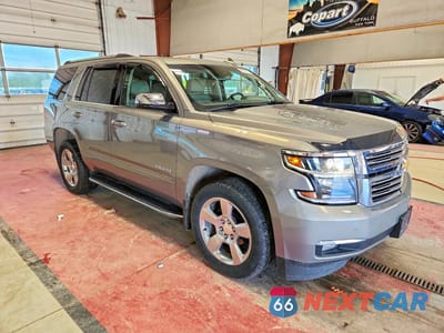 Czwarte zdjęcie samochodu z boku: 2019 CHEVROLET TAHOE K1500 PREMIER VIN:1GNSKCKC1KR403681 - miniatura