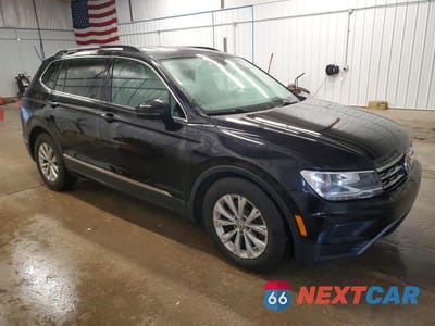 Czwarte zdjęcie samochodu z boku: 2018 VOLKSWAGEN TIGUAN SE VIN:3VV2B7AX8JM145004 - miniatura