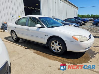 Czwarte zdjęcie samochodu z boku: 2000 FORD TAURUS SES VIN:1FAFP5528YG140741 - miniatura