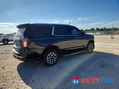 Trzecie zdjęcie samochodu z tyłu: 2021 CHEVROLET TAHOE C1500 LT VIN:1GNSCNKDXMR407104 - miniatura
