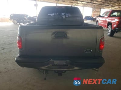 Zdjęcie 6 z 12 samochodu: 2002 FORD F150 SUPERCREW HARLEY DAVIDSON VIN:1FTRW07302KC78846 - miniatura
