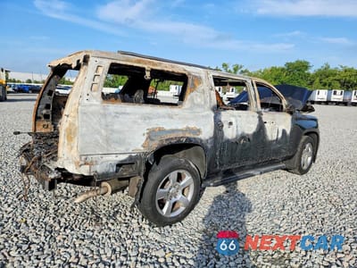 Trzecie zdjęcie samochodu z tyłu: 2017 CHEVROLET SUBURBAN K1500 PREMIER VIN:1GNSKJKC4HR389403 - miniatura