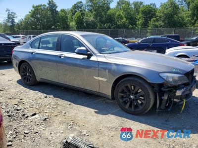 Czwarte zdjęcie samochodu z boku: 2014 BMW 740 I VIN:WBAYA6C54ED144335 - miniatura