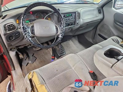 Zdjęcie 8 z 12 samochodu: 2001 FORD F150 VIN:1FTRX18L11NB36620 - miniatura