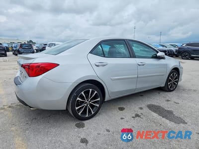 Trzecie zdjęcie samochodu z tyłu: 2017 TOYOTA COROLLA SE VIN:5YFBURHE4HP677944 - miniatura