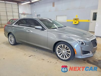 Czwarte zdjęcie samochodu z boku: 2016 CADILLAC CTS LUXURY COLLECTION VIN:1G6AX5SXXG0109182 - miniatura