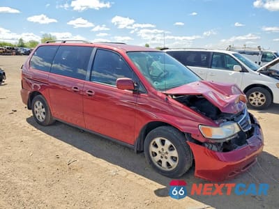Czwarte zdjęcie samochodu z boku: 2002 HONDA ODYSSEY EXL VIN:2HKRL18002H565797 - miniatura