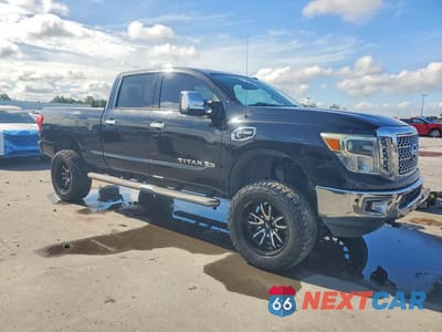 Czwarte zdjęcie samochodu z boku: 2017 NISSAN TITAN XD SL VIN:1N6BA1F46HN507339 - miniatura