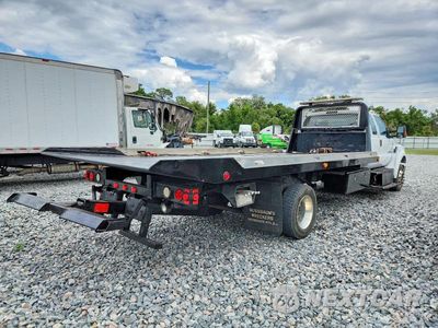 Czwarte zdjęcie samochodu z boku: 2018 FORD F650 SD - DELIVERY TRUCK VIN:1FDWX6DC1JDF00641 - miniatura
