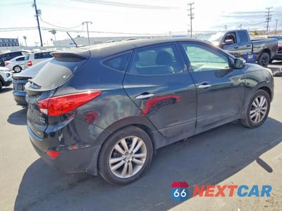 Trzecie zdjęcie samochodu z tyłu: 2012 HYUNDAI TUCSON LIMITED VIN:KM8JUCAC3CU510239 - miniatura
