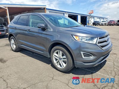 Czwarte zdjęcie samochodu z boku: 2016 FORD EDGE SEL VIN:2FMPK4J93GBC10657 - miniatura