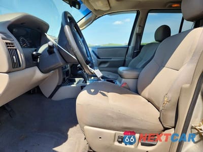 Zdjęcie 7 z 13 samochodu: 2004 JEEP GRAND CHEROKEE LAREDO VIN:1J4GW48S94C310642 - miniatura