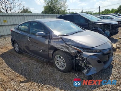 Czwarte zdjęcie samochodu z boku: 2022 TOYOTA PRIUS PRIME LE VIN:JTDKAMFP6N3221061 - miniatura