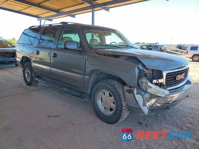 Czwarte zdjęcie samochodu z boku: 2001 GMC YUKON XL K1500 VIN:3GKFK16T21G271848 - miniatura