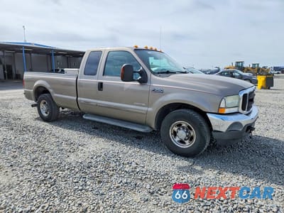 Czwarte zdjęcie samochodu z boku: 2004 FORD F250 SUPER DUTY VIN:1FTNX20P84ED87870 - miniatura