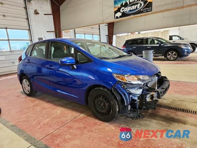 Czwarte zdjęcie samochodu z boku: 2020 HONDA FIT LX VIN:3HGGK5H4XLM718168 - miniatura