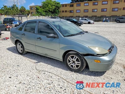 Czwarte zdjęcie samochodu z boku: 2003 FORD FOCUS SE VIN:1FAFP34P23W227986 - miniatura