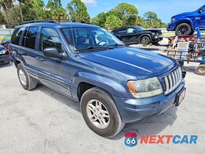 Czwarte zdjęcie samochodu z boku: 2004 JEEP GRAND CHEROKEE LAREDO VIN:1J8GX48SX4C295659 - miniatura