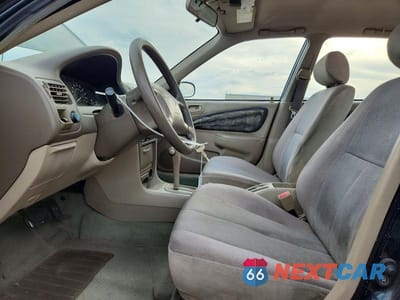 Zdjęcie 7 z 12 samochodu: 1999 TOYOTA COROLLA VE VIN:1NXBR12E3XZ268360 - miniatura