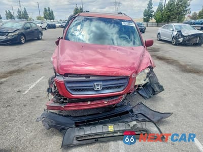 Piąte zdjęcie samochodu w środku: 2005 HONDA PILOT EXL VIN:2HKYF18795H569903 - miniatura