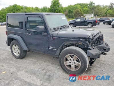 Czwarte zdjęcie samochodu z boku: 2010 JEEP WRANGLER SPORT VIN:1J4AA2D14AL102475 - miniatura