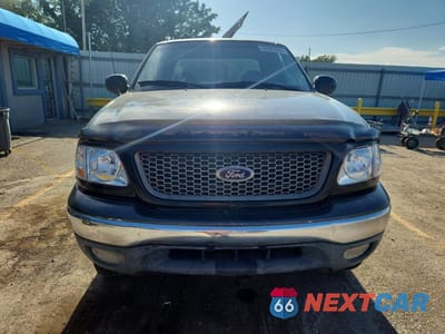 Piąte zdjęcie samochodu w środku: 2000 FORD F150 VIN:1FTRX08L6YKB35548 - miniatura