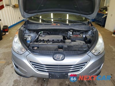 Zdjęcie 12 z 13 samochodu: 2012 HYUNDAI TUCSON GLS VIN:KM8JU3AC4CU515045 - miniatura