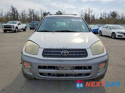 Piąte zdjęcie samochodu w środku: 2001 TOYOTA RAV4 BASE VIN:JTEHH20V610054449 - miniatura
