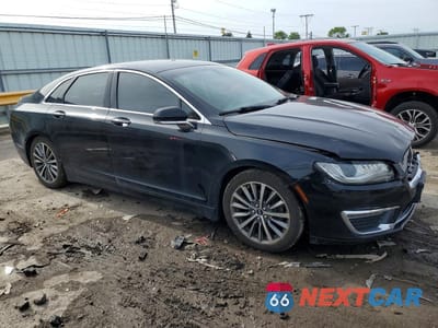 Czwarte zdjęcie samochodu z boku: 2017 LINCOLN MKZ HYBRID SELECT VIN:3LN6L5LU3HR603156 - miniatura