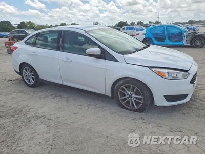Czwarte zdjęcie samochodu z boku: 2016 FORD FOCUS SE VIN:1FADP3F23GL356366 - miniatura