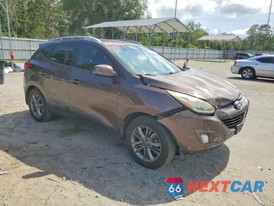 Czwarte zdjęcie samochodu z boku: 2015 HYUNDAI TUCSON SE VIN:KM8JU3AG5FU986872 - miniatura