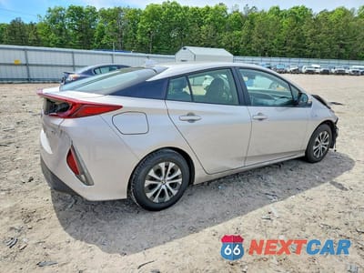 Trzecie zdjęcie samochodu z tyłu: 2022 TOYOTA PRIUS PRIME XLE VIN:JTDKAMFP7N3211137 - miniatura