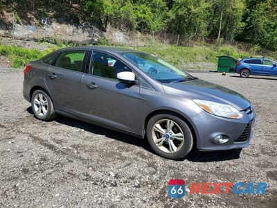 Czwarte zdjęcie samochodu z boku: 2012 FORD FOCUS SE VIN:1FAHP3F21CL432517 - miniatura
