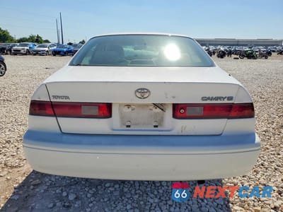 Zdjęcie 6 z 12 samochodu: 1999 TOYOTA CAMRY LE VIN:JT2BG22K6X0277284 - miniatura