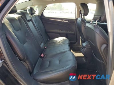Zdjęcie 10 z 12 samochodu: 2013 FORD FUSION TITANIUM VIN:3FA6P0K91DR216033 - miniatura