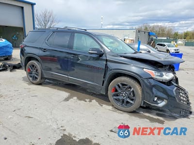 Czwarte zdjęcie samochodu z boku: 2020 CHEVROLET TRAVERSE PREMIER VIN:1GNEVKKW2LJ101972 - miniatura